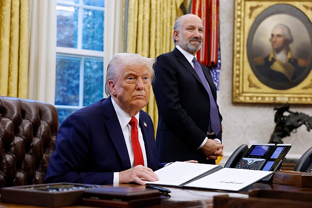 President Donald Trump, alongside Howard Lutnick, his nominee for Commerce Secretary, speaks to reporters in the Oval Office of the White House on February 3, in Washington.
Mandatory Credit:	Anna Moneymaker/Getty Images via CNN Newsource