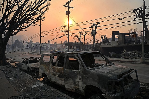 Charred vehicles are seen along a road after the passage of the Palisades Fire in Pacific Palisades, California last month.  Allstate insurance said paying claims from the fire will cost it an estimated $1.1 billion.
Mandatory Credit:	Agustin Paullier/AFP/Getty Images via CNN Newsource