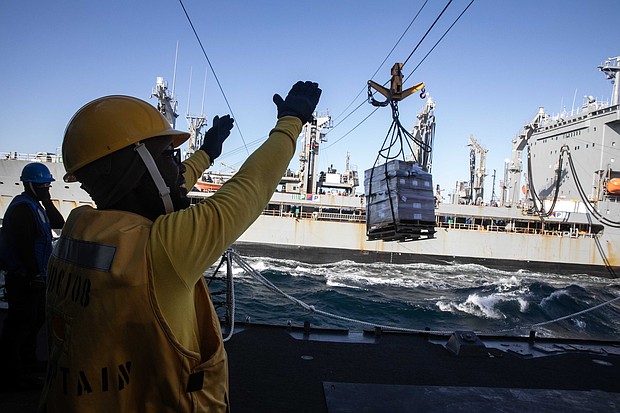 Boatswain’s Mate 2nd Class Erwinn Garrett from Houston, Texas (U.S. Navy Photo by Mass Communication Specialist 1st Class Charles J. Scudella III)