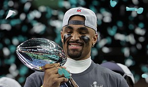 Philadelphia Eagles QB Jalen Hurts celebrates with the Vince Lombardi Trophy after winning the Super Bowl.
Mandatory Credit:	Mike Segar/Reuters via CNN Newsource