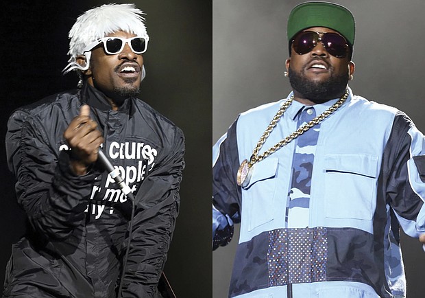 This combination of photos shows André 3000, left, and Big Boi of Outkast performing at Lollapalooza in Chicago’s Grant Park on Aug. 2, 2014.
