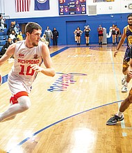 Richmond Ram Chargers center Seth Savage drives toward the basket during their game against the Prince George Valor on Feb. 8 at John Marshall High School. The Ram Chargers would go on to win the game 129-101.
