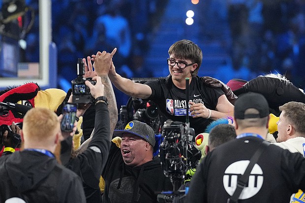 Caption:	Jaren Barajas won $100,000 by beating Damian Lillard in a shooting contest.
Mandatory Credit:	Kyle Terada/USA TODAY Sports/Reuters via CNN Newsource
