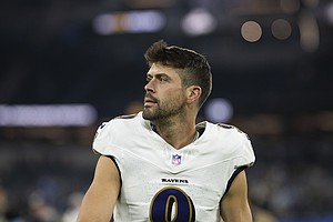 Justin Tucker walks back to the locker room after the Baltimore Ravens' game against the Los Angeles Chargers in November 2024.
Mandatory Credit:	Kyusung Gong/AP via CNN Newsource