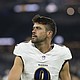 Justin Tucker walks back to the locker room after the Baltimore Ravens' game against the Los Angeles Chargers in November 2024.
Mandatory Credit:	Kyusung Gong/AP via CNN Newsource