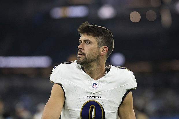 Justin Tucker walks back to the locker room after the Baltimore Ravens' game against the Los Angeles Chargers in November 2024.
Mandatory Credit:	Kyusung Gong/AP via CNN Newsource