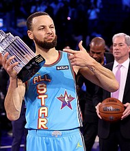 Golden State Warriors guard Stephen Curry poses with the 2025 KIA Kobe Bryant MVP trophy after leading Shaq's OGs to a win during the 74th NBA All-Star Game.
Mandatory Credit:	Ezra Shaw/Getty Images via CNN Newsource