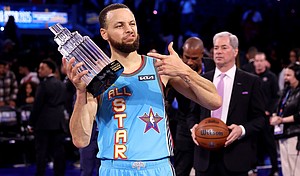 Golden State Warriors guard Stephen Curry poses with the 2025 KIA Kobe Bryant MVP trophy after leading Shaq's OGs to a win during the 74th NBA All-Star Game.
Mandatory Credit:	Ezra Shaw/Getty Images via CNN Newsource