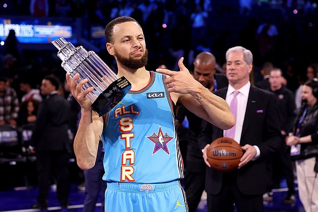 Golden State Warriors guard Stephen Curry poses with the 2025 KIA Kobe Bryant MVP trophy after leading Shaq's OGs to a win during the 74th NBA All-Star Game.
Mandatory Credit:	Ezra Shaw/Getty Images via CNN Newsource