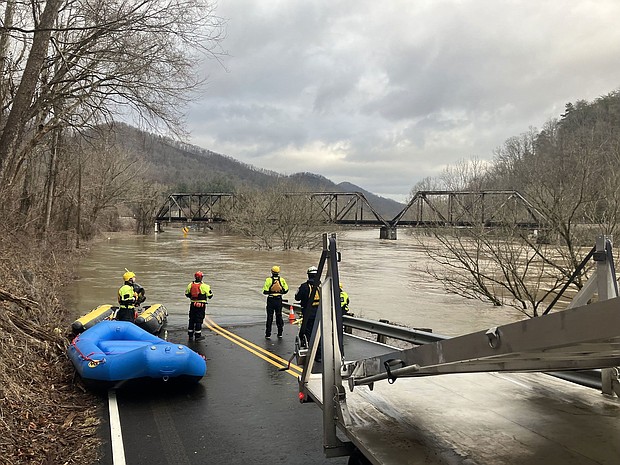 Crews with multiple agencies assisted with water rescues in southwest Virginia on Sunday amid ongoing flooding in the area.
Mandatory Credit:	Chesterfield County Fire and EMS via CNN Newsource