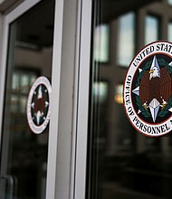 A view shows logos of the Office of Personnel Management in Washington, DC, after probationary staff at the OPM were fired in a conference call on February 13.
Mandatory Credit:	Tierney L. Cross/Reuters via CNN Newsource