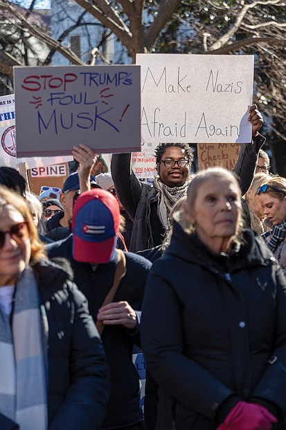 Hundreds of demonstrators, part of a nationwide
movement called “50 Protests, 50 States, 1 Day”
convened at the Bell Tower in Capitol Square on
Presidents Day, Feb. 17.