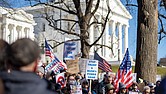 Hundreds of demonstrators gathered at the Bell Tower in Capitol Square on Presidents Day, Feb. 17, as part of the nationwide movement “50 Protests, 50 States, 1 Day,” opposing the policies of President Trump’s administration.