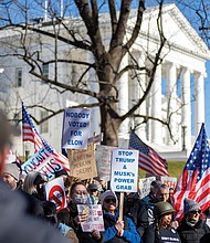 Hundreds of demonstrators gathered at the Bell Tower in Capitol Square on Presidents Day, Feb. 17, as part of the nationwide movement “50 Protests, 50 States, 1 Day,” opposing the policies of President Trump’s administration.