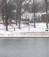 A runner makes their way through Byrd Park on Wednesday, Feb. 19.