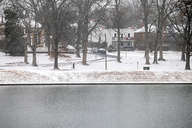 A runner makes their way through Byrd Park on Wednesday, Feb. 19.