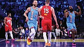 Team Shaq’s Stephen Curry and James Harden react to a Curry 3-pointer Feb. 16 against Team Chuck in the championship game of the 74th NBA All-Star Game in San Francisco.