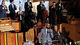 The Rev. William H. Lamar IV, front, leads the Palm Sunday 2024 service at the Metropolitan AME Church in Washington.