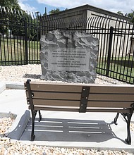A marker memorializing Confederate soldiers, seen here with a bench that was later removed, remains at a substation on Wise Street.