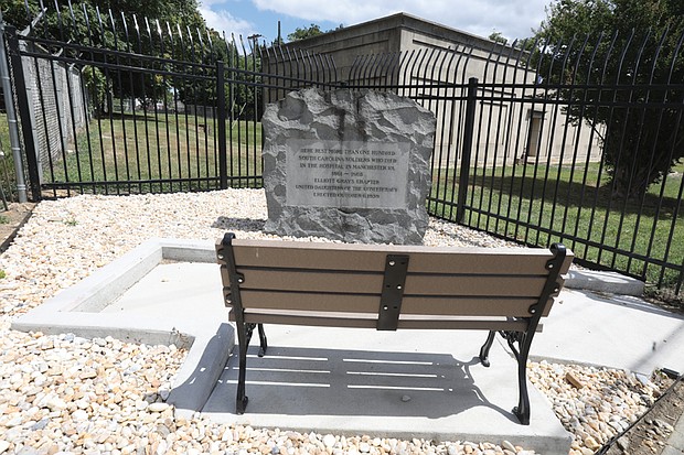 A marker memorializing Confederate soldiers, seen here with a bench that was later removed, remains at a substation on Wise Street.