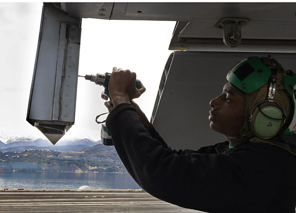 Houston’s spirit of determination and resilience sails the high seas with Aviation Structural Mechanic Airman Kyshaun Brownlee, who plays a …