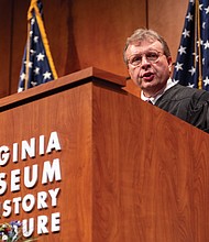 The Hon. David J. Novak, U.S. District Judge for the Eastern District of Virginia, lead the naturalization ceremony at the Virginia Museum of History and Culture on Presidents Day, Feb. 17. The event was held in partnership with the U.S. District Court for the Eastern District of Virginia and U.S. Citizenship and Immigration Services.