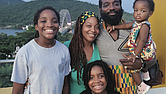 Ahkbar (12), Indee, Selasi-Mawu (7), Alkabulan Kudjo and Vivi Sefofo (2) at Bridgeview Hotel, overlooking the Adomi Bridge in Atimpoku, Eastern Region, Ghana.