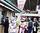 Nutzy and Nutasha pose with baseball fans.