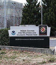 Signage outside the National Oceanic and Atmospheric Administration (NOAA) Center for Weather and Climate Prediction headquarters in College Park, Maryland, on December 5. Around 800 NOAA employees have been tapped for termination.
Mandatory Credit:	Michael A. McCoy/Bloomberg/Getty Images/File via CNN Newsource