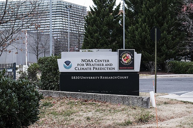 Signage outside the National Oceanic and Atmospheric Administration (NOAA) Center for Weather and Climate Prediction headquarters in College Park, Maryland, on December 5. Around 800 NOAA employees have been tapped for termination.
Mandatory Credit:	Michael A. McCoy/Bloomberg/Getty Images/File via CNN Newsource
