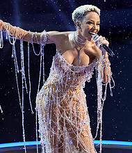 Doja Cat performs onstage at the 97th Oscars