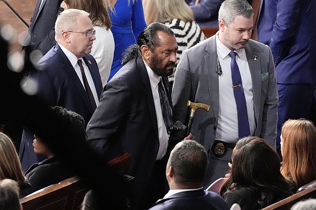 Rep. Al Green is escorted out as President Donald Trump addresses a joint session of Congress at the Capitol in Washington, DC, on March 4. House Republicans are immediately moving to punish Green for repeatedly disrupting Trump’s speech.
Mandatory Credit:	Alex Brandon/AP via CNN Newsource