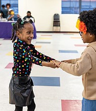Zoey, 5 (left) dances with her best friend Koi, 6, at the Black AF event Feb. 28 at Diversity Richmond. Curated by For The Fem In You, the event celebrated Black love in all forms, featuring food, art, wellness and music.