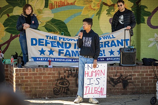 Elijah Lee, 17, addresses a crowd of about 50 people March 2 at Jefferson Park during an emergency defense rally organized by Virginia’s Party for Socialism and Liberation.