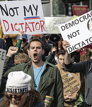 Marching from Monroe Park to Capitol Square, hundreds of protesters in Richmond on Tuesday, March 4, took to the streets in a demonstration organized by the Virginia chapter of the 50501 movement.