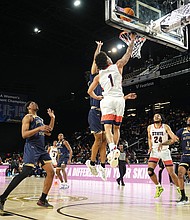 Virginia State’s Jacob Cooper makes a layup during the 2025 CIAA Men’s Basketball Tournament Championship game, helping lead the Trojans to a 71-64 victory over Bluefield State.