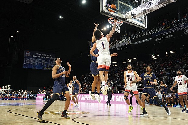 Virginia State’s Jacob Cooper makes a layup during the 2025 CIAA Men’s Basketball Tournament Championship game, helping lead the Trojans to a 71-64 victory over Bluefield State.