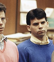 Lyle and Erik Menendez sit in court in December 1992 alongside their attorneys Leslie Abramson, left, and Jill Lansing, right.
Mandatory Credit:	Chris Martinez/AP via CNN Newsource