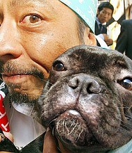 Why dogs look like their owners could shed some light on certain aspects of humans' social behaviors too, experts say.
Mandatory Credit:	Yoshikazu Tsuno/AFP/Getty Images via CNN Newsource