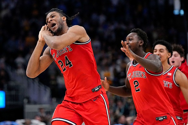 St. John’s Red Storm forward Zuby Ejiofor celebrates after hitting the buzzer-beater against Marquette.
Mandatory Credit:	Jeff Hanisch/Imagn/Reuters via CNN Newsource