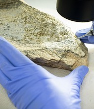 Researchers study the markings left by ancient human ancestors, who used elephant and hippopotamus bones to create tools 1.5 million years ago.
Mandatory Credit:	CSIC via CNN Newsource