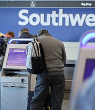 Southwest Airlines is ending its most recognizable perks: Free checked baggage. The airline will begin charging for the first and second checked bag beginning on May 28, Southwest announced March 11.
Mandatory Credit:	Scott Olson/Getty Images/File via CNN Newsource