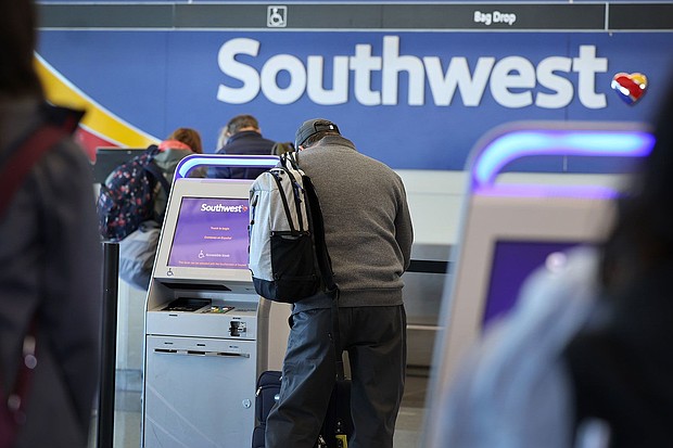 Southwest Airlines is ending its most recognizable perks: Free checked baggage. The airline will begin charging for the first and second checked bag beginning on May 28, Southwest announced March 11.
Mandatory Credit:	Scott Olson/Getty Images/File via CNN Newsource