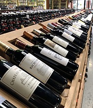 Bottles of French wine are displayed for sale in a liquor store. President Donald Trump on March 13 threatened to impose a massive tariff on European alcohol in response to the European Union’s retaliation against his steel and aluminum tariffs – a tit-for-tat escalation of a trade war that could easily get out of hand.
Mandatory Credit:	Mario Tama/Getty Images via CNN Newsource