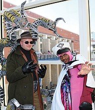 Two cosplayers showcase their creative costumes at a recent GalaxyCon event held at the Greater Richmond Convention Center.