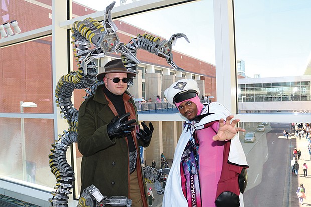 Two cosplayers showcase their creative costumes at a recent GalaxyCon event held at the Greater Richmond Convention Center.