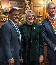 Mayor Danny Avula and Virginia Delegate Betsy Carr, D-78th District, pose for a photo with Mayor Richard Pyne of Richmond upon Thames, a borough in London, during his visit to the River City last week. They met March 6 at Virginia House for “The Two Richmonds” event, which highlighted the historic ties between the two cities. Richmond, Va., was named after Richmond, England, due to the similar views of the James River and the River Thames.