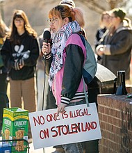 Kienan Chung, community organizer and activist, speaks to a crowd gathered at Jefferson Park on Sunday, March 2, during a rally held by Virginia’s section of the Party for Socialism and Liberation.