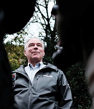 Sen. Tim Kaine, D-Va., talks to reporters after voting in Richmond recently.