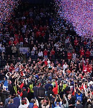 St. Johns secured their first Big East title since 2000 following a 82-66 win over Creighton on Saturday.
Mandatory Credit:	Frank Franklin II/AP via CNN Newsource